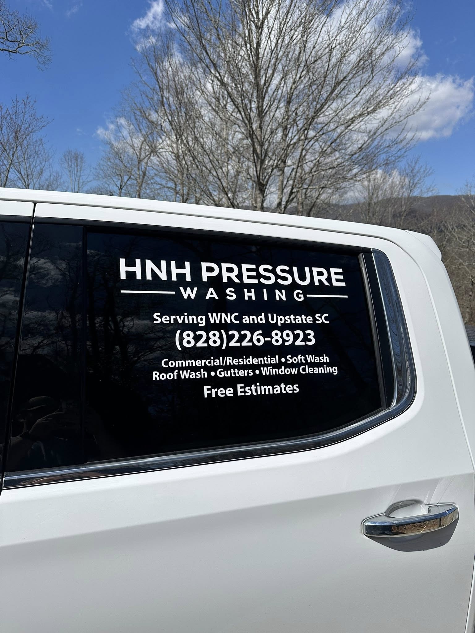 HNH Pressure Washing branded service truck with company decal